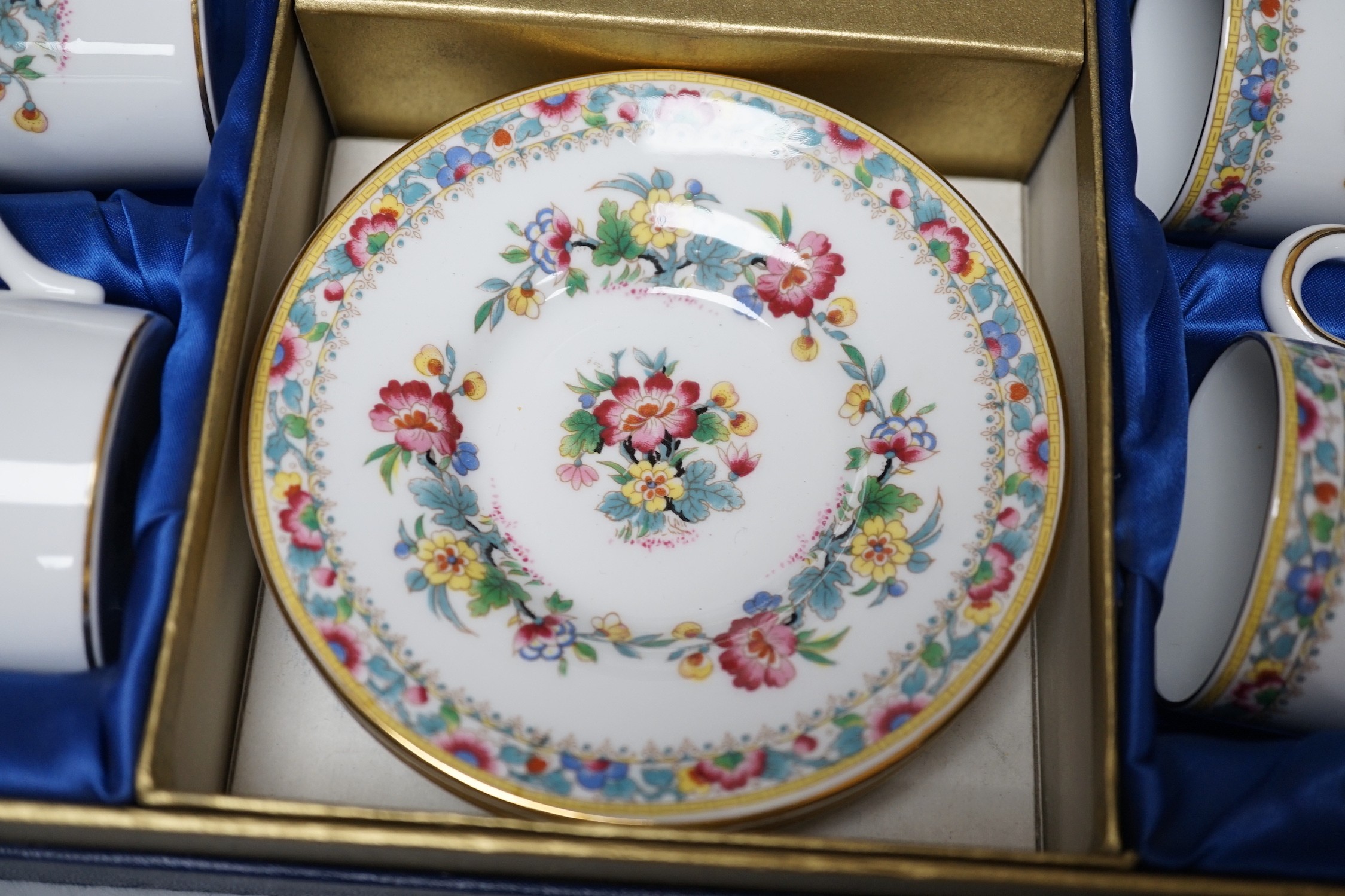 A Coalport floral coffee set, boxed